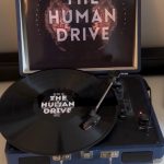 The Human Drive album playing on a record player