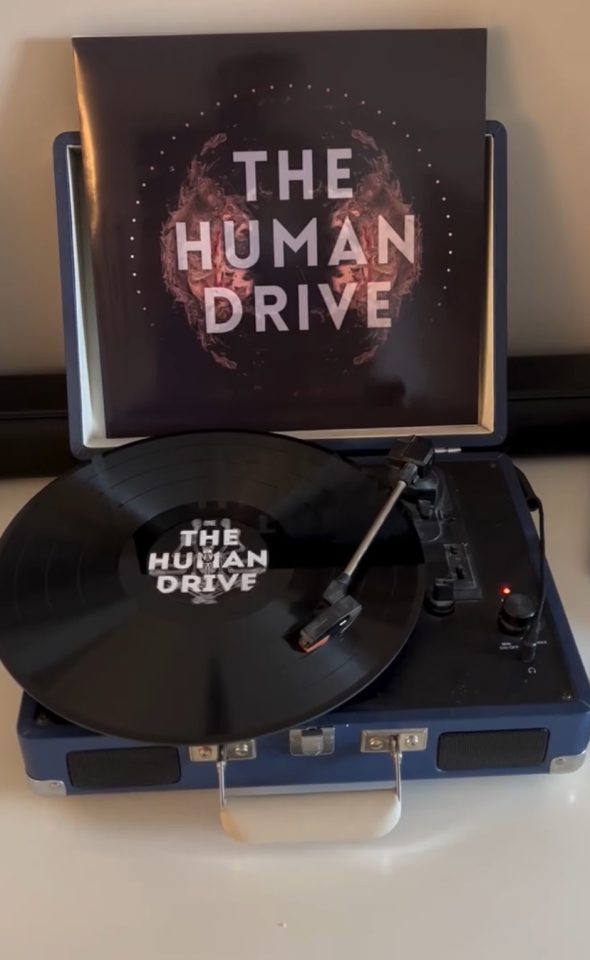 The Human Drive album playing on a record player